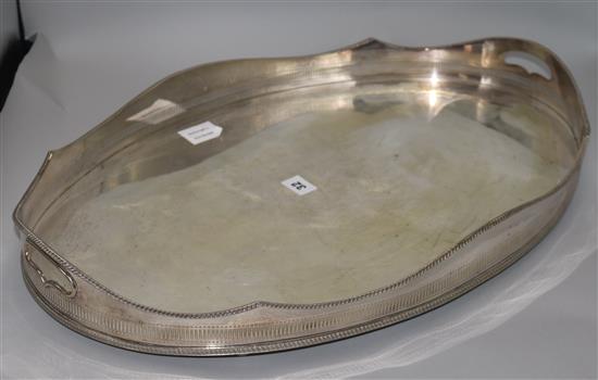 A plated oval galleried two handled tea tray